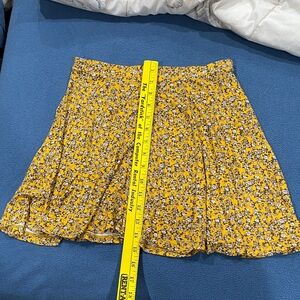 Wet Seal Yellow Floral Mini Skirt. Gently worn a few times. Smoke free home.